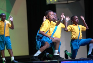 Students from the Clan Carthy Primary School doing a speech titled “Laughing Ago Spoil” at the 2024 staging of Mello-Go-Roun held at the National Indoor Sports Centre in Kingston.