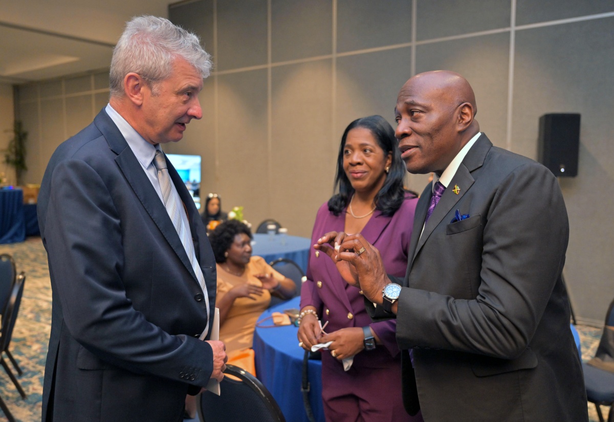 Chief Justice, Hon. Bryan Sykes (right), in conversation with Chargé d’Affaires, European Union Delegation in Jamaica, Piotr Byczkowski (left), during the recent Caribbean Court of Justice (CCJ) workshop, held at The Jamaica Pegasus hotel in New Kingston. Listening at centre is President of the Court of Appeal, Hon. Justice Marva McDonald Bishop.

