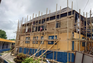 Repair work in progress at Westwood High School in Trelawny in August 2024. The National Education Trust (NET) spearheaded the repairs, which were completed at a cost of $99 million.

