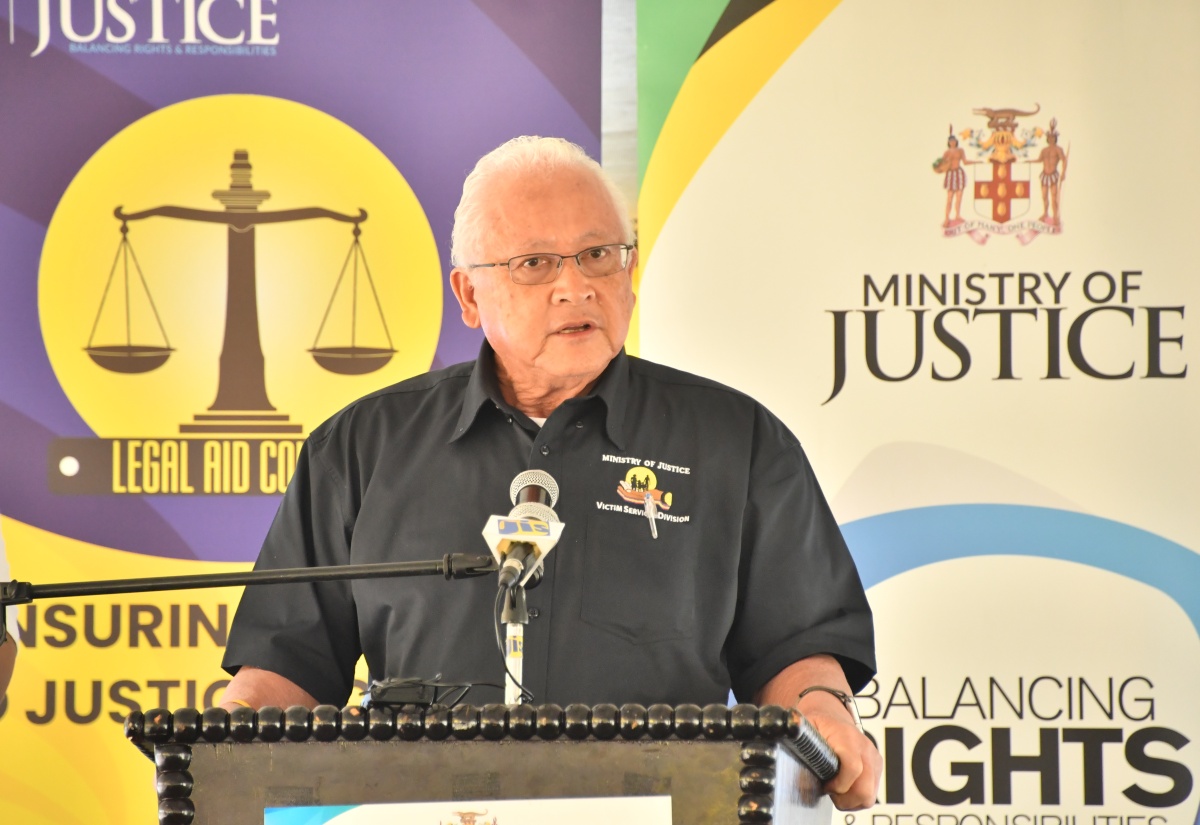 Minister of Justice , Hon. Delroy Chuck, addresses the opening ceremony for the Legal Aid Council’s (LAC) justice fair for persons with disabilities held at Independence Park in Savanna-La- Mar, Westmoreland, on Friday (Feb. 14).