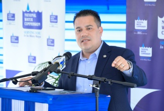 Minister without Portfolio in the Ministry of Economic Growth and Job Creation, Senator the Hon. Matthew Samuda, speaks today (February 21), during the Commissioning Ceremony for the Stanton Housing Scheme Water Upgrade Project in St. Thomas. The Minister has responsibility for Water and the Environment.