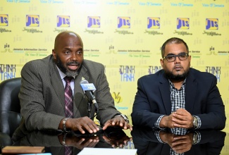 Director General, Office of Disaster Preparedness and Emergency Management (ODPEM), Richard Thompson (left), speaks about Jamaica's vulnerability to seismic activities, during a recent JIS Think Tank at the agency's head office in Kingston.


