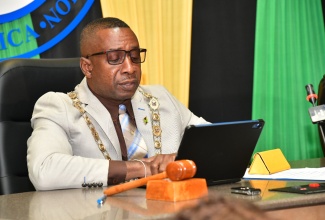 Mayor of Kingston, Councillor Andrew Swaby, addresses the Kingston and St. Andrew Municipal Corporation’s General Sitting of Council held at 24 Church Street in downtown Kingston on Tuesday (February 11).