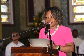 Minister of Education, Skills, Youth and Information, Senator Dr. the Hon. Dana Morris Dixon, pays tribute during Saturday’s (February 8) Thanksgiving Service for late Jessie Ripoll Primary School Principal, O’Neil Stevens, and wife, Camesha Lindsay-Stevens, at the Cathedral of the Most Holy Trinity in Kingston.