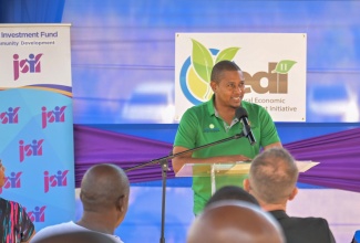 Minister of Agriculture, Fisheries and Mining, Hon. Floyd Green, addresses the ground breaking for the cold storage facility at Content Greenhouse Cluster in Kinkvine, Manchester, on Thursday (February 20).