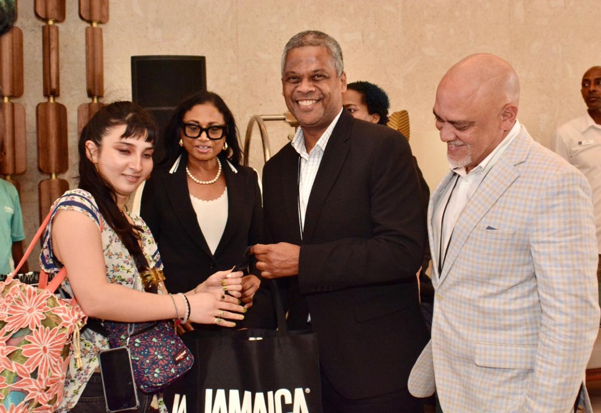 Tokyo 2020 Olympics volunteer, Teiyana Kawashima Stojkovic (left) is greeted by (from second left) Tourism Regional Director, Odette Dyer; Deputy Director of Marketing, Jamaica Tourist Board (JTB), Peter Mullings; and President of the Jamaica Hotel and Tourist Association (JHTA), Robin Russell, during a welcome reception at the Princess Grand Hotel, Hanover on February 17.

 
