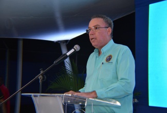 Minister of Science, Energy, Telecommunications and Transport, Hon. Daryl Vaz, addresses the opening of Magna Motors’ modern showroom and service centre in Montego Bay, St. James, on February 13.


