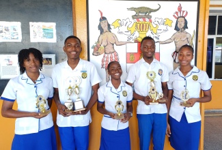 Students at the St. Catherine-based José Martí Technical High School, show off awards for achievement in academics, sports, and other areas. They are (from left) Chayanne Daley, Chevaughn Johnson, Sanique Roberts, Carlus Evans, and Ashawna Sibbles.