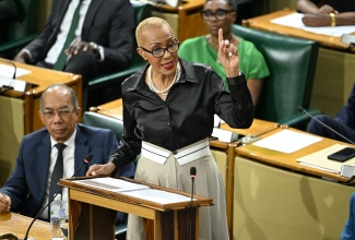 Minister of Finance and the Public Service, Hon. Fayval Williams, gives her maiden Budget presentation in the House of Representatives, on Tuesday (March 11).

