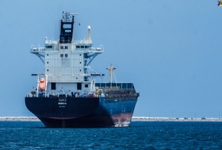 A cargo ship moored in the Kingston Harbour

