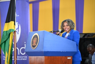 Minister of Education, Skills, Youth and Information, Dr. the Hon. Dana Morris Dixon, delivers the keynote address during the Beginning Teachers Synergy Conference at The Mico University College in Kingston on Tuesday (March 4).