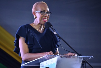Minister of Finance and the Public Service, Hon. Fayval Williams, addresses the ‘Own di Road’ town hall hosted by NCB Capital Markets at Harmony Beach Park in Montego Bay, St. James, on Saturday (March 8).

