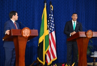 Prime Minister, Dr. the Most Hon. Andrew Holness (right), provides an update on bilateral discussions held with United States (US) Secretary of State, Hon. Marco Rubio, during a joint press conference at the Office of the Prime Minister on Wednsday (March 26).