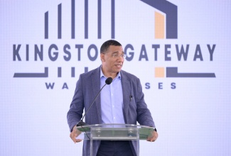 Prime Minister, Dr. the Most Hon. Andrew Holness, addresses Friday’s (April 11) groundbreaking ceremony for the Kingston Gateway Commercial and Warehouse Complex at 221-223 Marcus Garvey Drive.