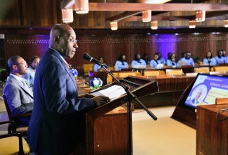 Minister of Industry, Investment and Commerce, Senator the Hon. Aubyn Hill, addresses the University of Technology of Jamaica (UTech) 43rd Annual Marketing Seminar, held on Wednesday, April 9, at the Jamaica Conference Centre, in downtown Kingston.

