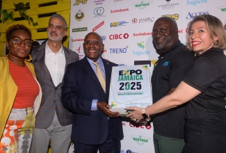 Industry, Investment and Commerce Minister, Senator the Hon. Aubyn Hill (third left), joins in displaying the Expo Jamaica 2025 logo at the recent media launch of the event at The Jamaica Pegasus hotel in New Kingston. From left are Executive Director of the Jamaica Manufacturers and Exporters Association (JMEA), Kamesha Turner-Blake; President of the JMEA, Sydney Thwaites; Chair of the Expo Jamaica Committee, Aswad Morgan; and Deputy President, JMEA, Kathryn Silvera. Expo Jamaica will be held from Thursday (April 3) to Sunday (April 6) at the National Arena and the National Indoor Sports Centre in Kingston.

