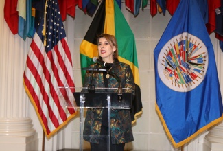 United States (US) Deputy Assistant Secretary for Caribbean Affairs, Haiti and Bureau of Western Hemisphere, Barbara Feinstein, addresses a farewell reception for former Jamaican Ambassador to the US and Permanent Representative to the Organization of American States (OAS), Senator the Hon. Audrey Marks, at the OAS Hall of the Americas in Washington DC on Friday (March 28).

