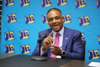Managing Director, Jamaica Social Investment Fund (JSIF), Omar Sweeney, outlines several projects to be implemented under the Rural Economic Development Initiative II (REDI II), during a recent JIS Think Tank in Kingston.

