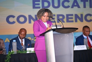 Minister of Education, Skills, Youth and Information, Senator Dr. the Hon. Dana Morris Dixon, addresses day one (April 22) of the three-day Jamaica Teachers’ Association (JTA) Education Conference 2025, being held at Ocean Coral Spring in Trelawny.