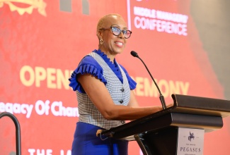 Minister of Finance and the Public Service, Hon. Fayval Williams, delivers opening remarks on day one of the Make Your Mark Consultants (MYMC) two-day Middle Managers’ Leadership Conference at The Jamaica Pegasus hotel in New Kingston on Tuesday (April 29).

