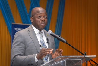 Minister of Labour and Social Security, Hon. Pearnel Charles Jr., adresses the 2025 Organisation Development Transformation Week Conference, held at The Jamaica Pegasus hotel in New Kingston, on Tuesday (April 15).

