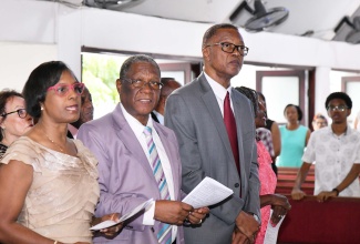 Acting Permanent Secretary in the Ministry of Labour and Social Security, Dione Jennings (left), along with Chairman of the Industrial Disputes Tribunal (IDT), Errol Miller (centre) and Deputy Chairman, IDT, Danny Roberts, participate in the IDT’s 50th Anniversary Church Service held at the Webster Memorial United Church in Kingston on April 6.