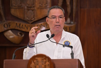 Minister of Science, Energy, Telecommunications and Transport,  Hon. Daryl Vaz, addresses a post-Cabinet press briefing held at Jamaica House on Wednesday (April 9).