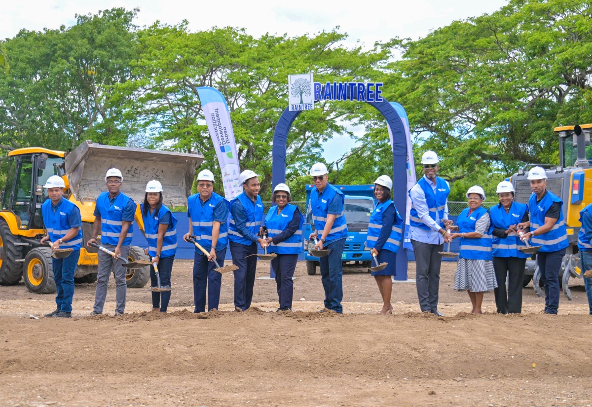Prime Minister, Dr. the Most Andrew Holness (centre), is joined by representatives from government, the Urban Development Corporation and Asphaltic Concrete Enterprise and other stakeholders to break ground for the RainTree Commercial Complex, located just outside Kingston at Caymanas Estate, in Ferry Pen, St. Catherine, on April 16.


