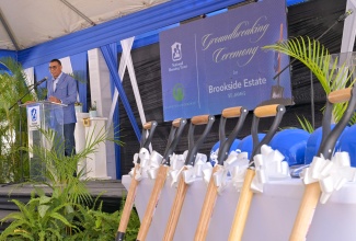 Prime Minister, Dr. the Most Hon. Andrew Holness, addresses the groundbreaking ceremony for the new Brookside Estate Housing Development in Spot Valley, St. James on April 25.
