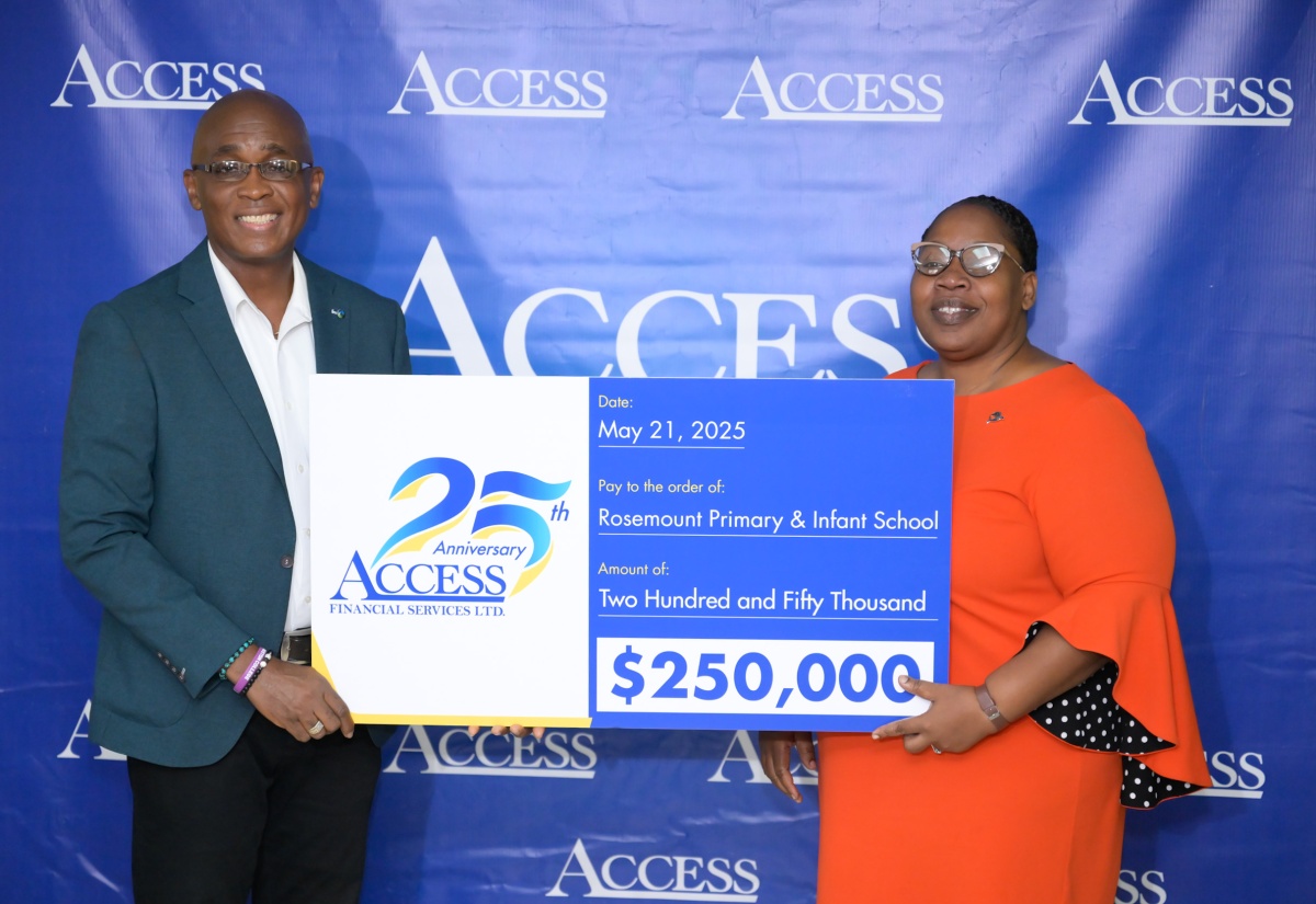 Chief Executive Officer, Access Financial Services Limited, Hugh Campbell, hands over a donation to Principal of Rose Mount Primary and Infant School, Malaika Sinclair-Bailey, during the launch of the company’s ‘Access Hope’ initiative at the entity’s headquarters in Kingston on May 21.

