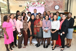 Prime Minister, Dr. the Most Hon. Andrew Holness, shares a photo opportunity with members of staff during a special Mother’s Day function on Thursday (May 8). The event was held at the Office of the Prime Minister. The function honoured mothers who are staff members of the Office of the Prime Minister, Jamaica House, and the Office of the Cabinet. Mother’s Day 2025 was observed on Sunday, May 11.