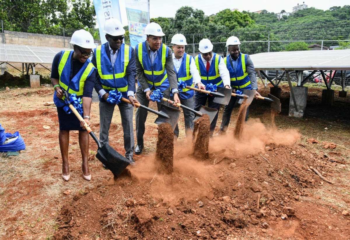 Prime Minister, Dr. the Most Hon. Andrew Holness (third left), breaks ground on the Ferry to Rock Pond Pipeline Project in St. Andrew on Tuesday, May 27. Joining him (from left) are Minister of State in the Ministry of National Security and Member of Parliament for St. Andrew West Rural, Hon. Juliet Cuthbert-Flynn; Member of Parliament for St. Andrew North Western, Duane Smith; Minister without Portfolio in the Ministry of Economic Growth and Job Creation, Hon. Matthew Samuda; Member of Parliament for St. Andrew Western, Anthony Hylton; and Acting Vice President of Operations at the National Water Commission, Herman Fagan. The over $1 billion-project will benefit more than 26,000 residents in the Red Hills and surrounding communities.


