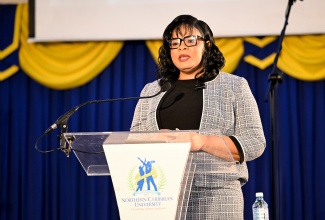 Chief Executive Officer of the Child Protection and Family Services Agency (CPFSA), Laurette Adams-Thomas, brings greetings at the national Child Month church service held recently at the Northern Caribbean University’s (NCU) Seventh Day Adventist Church in Mandeville, Manchester.