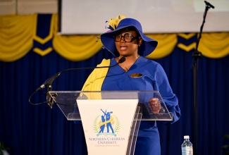 Chair of the National Child Month Committee (NCMC), Nicole Patrick Shaw, speaks at the National Church Service to mark the start of Child Month, at the Seventh Day Adventist Church, Northern Caribbean University, Mandeville, Manchester, on May 3.