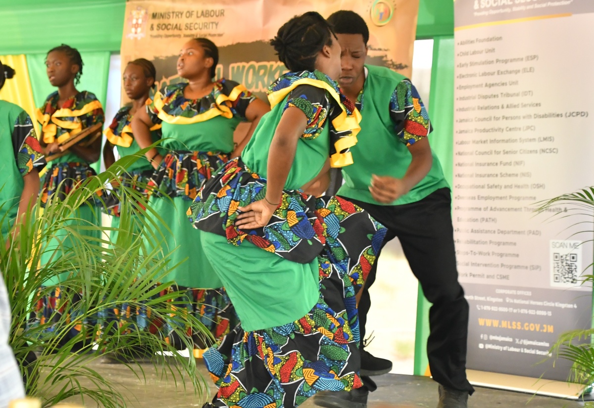 Students of Grange Hill High School perform a cultural item during the opening ceremony for the ‘Frome Reflections’ event at Workers’ Park in Westmoreland on May 22.

