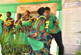 Students of Grange Hill High School perform a cultural item during the opening ceremony for the ‘Frome Reflections’ event at Workers’ Park in Westmoreland on May 22.