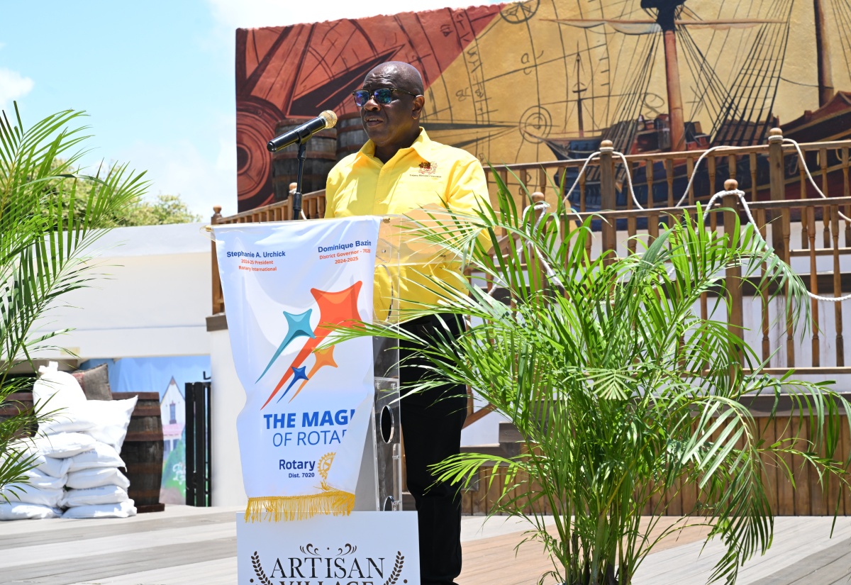 Mayor of Falmouth, Councillor Collen Gager, addresses a welcome reception for delegates of Rotary District 7027 Conference Cruise, at the Falmouth Artisan Village in Trelawny, on May 7.