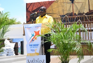 Mayor of Falmouth, Councillor Collen Gager, addresses a welcome reception for delegates of Rotary District 7027 Conference Cruise, at the Falmouth Artisan Village in Trelawny, on May 7.