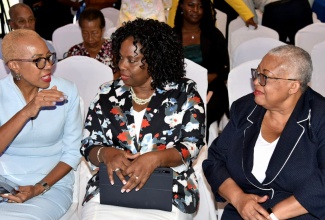 Minister of Finance and the Public Service,  Hon Fayval Williams (left), in conversation with Chairman of the Board of Cumax Wealth Management Limited, Andrea Wilson-Messam (centre), and Managing Director of the Jamaica Stock Exchange (JSE), Dr. Marlene Street-Forrest, at the recent Cumax Wealth Management Spring Investment Forum, at the Terra Nova All-Suite Hotel in Kingston. The Forum was held under the theme ‘Trade Winds or Trade Woes: The Tariff Effect on Jamaica’s Economy’.

