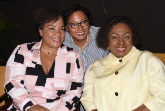 Minister of Culture, Gender, Entertainment and Sport, Hon. Olivia Grange (right), shares a photo opportunity with (from left) Women’s Centre of Jamaica Foundation (WCJF) Board Chair, Debby-Ann Brown Salmon, and Culture, Health, Art, Sports and Education (CHASE) Fund Public Relations and Administrative Manager, Hilary Coulton. The occasion was the WCJF Empowered Futures Parenting Symposium at the Jamaica Conference Centre in downtown Kingston on May 9.