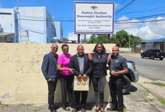 Members of the Police Civilian Oversight Authority (PCOA) with Citizen Corner Podcast guest Assistant Commissioner of Police (ACP), Desmond Brooks (centre), of the Inspectorate and Professional Standards Oversight Bureau (IPROB). They are (from left) Senior Director, Inspections and Monitoring, Andrew Beaumont; Communications and PR Manager, Karen Cadien; PCOA Chief Executive Officer, Otarah Byfield Nugent; and Legal Counsel, Sheldon Clarke.