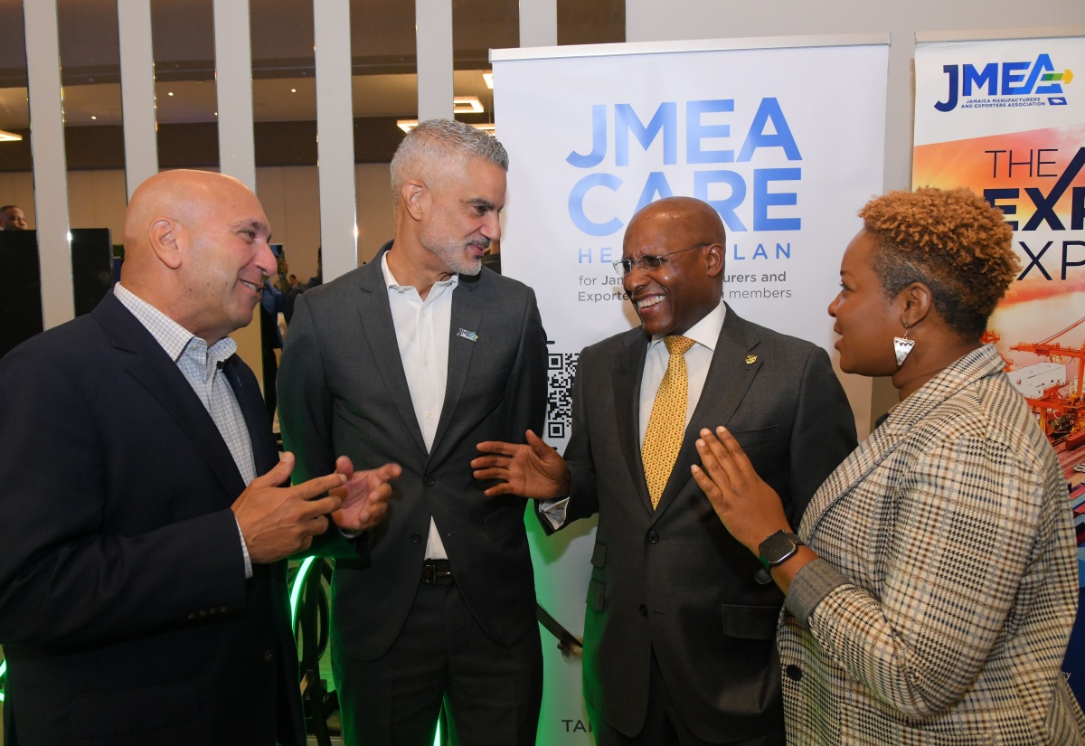 Minister of Industry, Investment and Commerce, Senator the Hon. Aubyn Hill  (second right), in discussion with (from left) President and Chief Executive Officer, Sagicor Group Jamaica Limited, Christopher Zacca; President, Jamaica Manufacturers and Exporters Association (JMEA), Sydney Thwaites and Executive Director, JMEA, Kamesha Blake, during the Jamaica Manufacturers and Exporters Association (JMEA) Manufacture 360° Conference, at the AC Marriott Hotel in St. Andrew on May 29. 

