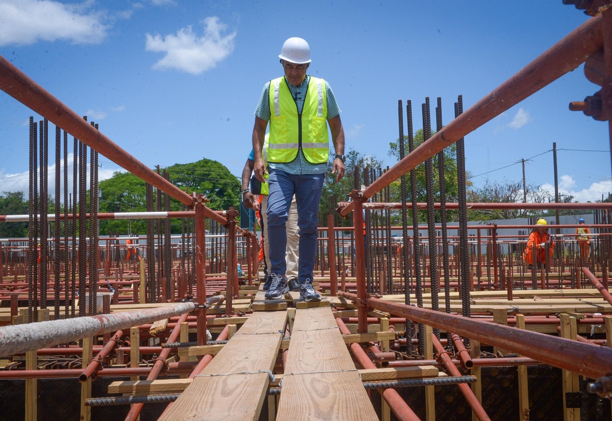 Minister of Health and Wellness, Dr. the Hon. Christopher Tufton, views construction work at the Spanish Town Hospital under the multibillion-dollar redevelopment project, during a tour of the project site on Wednesday, (April 30).

