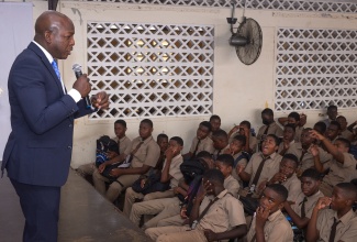 Minister of Labour and Social Security, Hon. Pearnel Charles Jr., addresses male students at the Clarendon-based Central High School, during the institution’s observance of Boys’ Day on Tuesday (April 30).

