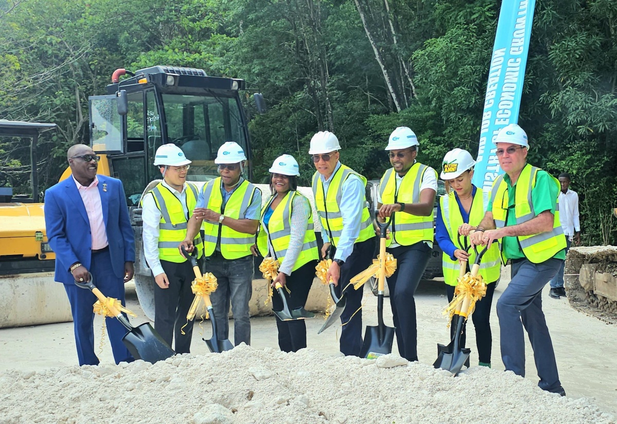 Prime Minister, Dr. the Most Hon. Andrew Holness (fourth right), and Minister without Portfolio in the Ministry of Economic Growth and Job Creation with Responsibility for Works, Hon. Robert Morgan (third right), lead the symbolic breaking of ground for the Port Antonio Bypass project in Portland on June 26.