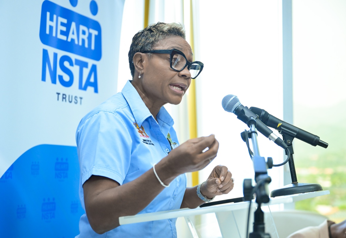 Minister of State in the Ministry of National Security, Hon. Juliet Cuthbert Flynn, addresses Friday’s (June 27) signing ceremony for a Memorandum of Understanding (MOU) formalising a partnership involving the Ministry, Department of Correctional Services (DCS), and HEART NSTA Trust to provide inmates and wards of the State with the skills and training deemed necessary to secure a meaningful employment upon release. The signing took place at the Ministry’s offices in New Kingston.