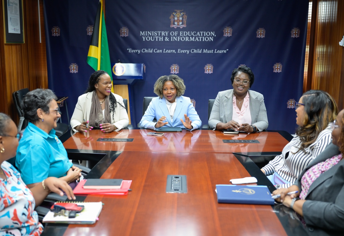 Minister of Education, Skills, Youth and Information, Senator Dr. the Hon. Dana Morris Dixon (centre, head table), engages in discussion with members of the Jamaica Independent Schools’ Association (JISA), during a courtesy call at the Ministry’s Heroes Circle offices in Kingston on Tuesday (June 3). Pictured (from left) are Principal at St. Hugh’s Preparatory, Sasha Wright; Director, Liberty Academy at the Priory, Susan Williams; Permanent Secretary in the Ministry, Dr. Kasan Troupe; Acting Chief Education Officer, Terry-Ann Thomas-Gayle; JISA President, Tamar McKenzie; and Registrar, Independent Schools
