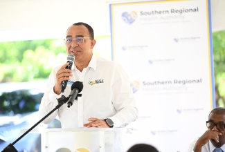 Minister of Health and Wellness, Dr. the Hon. Christopher Tufton, delivers the keynote address at the reopening of the Toll Gate Health Centre in Clarendon, following refurbishing works under Operation Refresh.