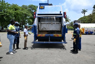 National Solid Waste Management Authority (NSWMA) personnel give a demonstration during a National Solid Waste Day exposition at Rudolph Elder Park in Morant Bay, St. Thomas, on June 6.

