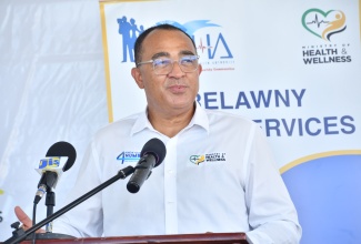 Minister of Health and Wellness, Dr. the Hon. Christopher Tufton, addresses a press briefing during a visit to the Falmouth Health Centre in Trelawny,  on Friday (June 13). 

